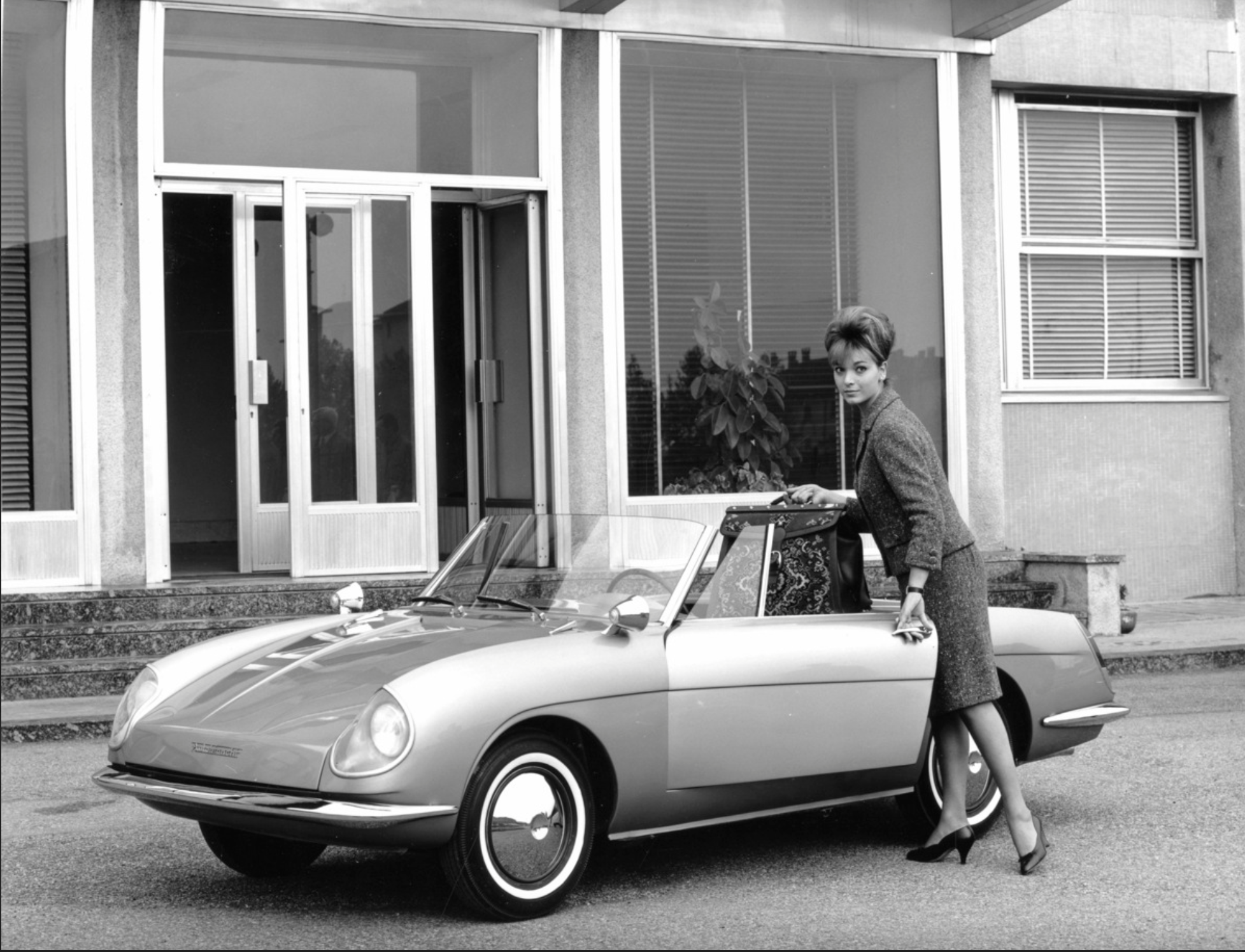 Autobianchi Stellina press photo — front three-quarter with woman