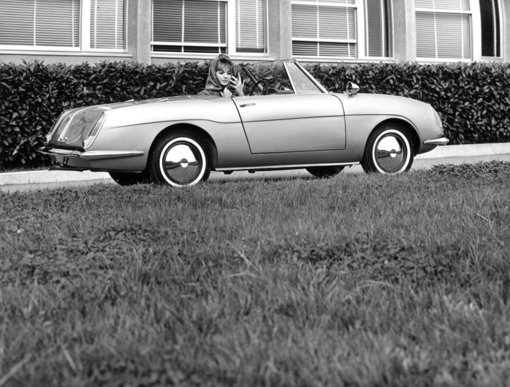 Autobianchi Stellina press photo — side profile with driver