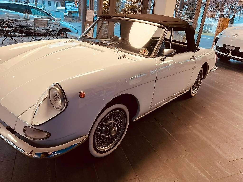 Autobianchi Stellina — unidentified, white wire wheels Switzerland
